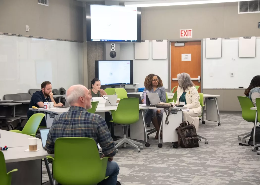Members of the 2025 Data Institute gather in the TILL.